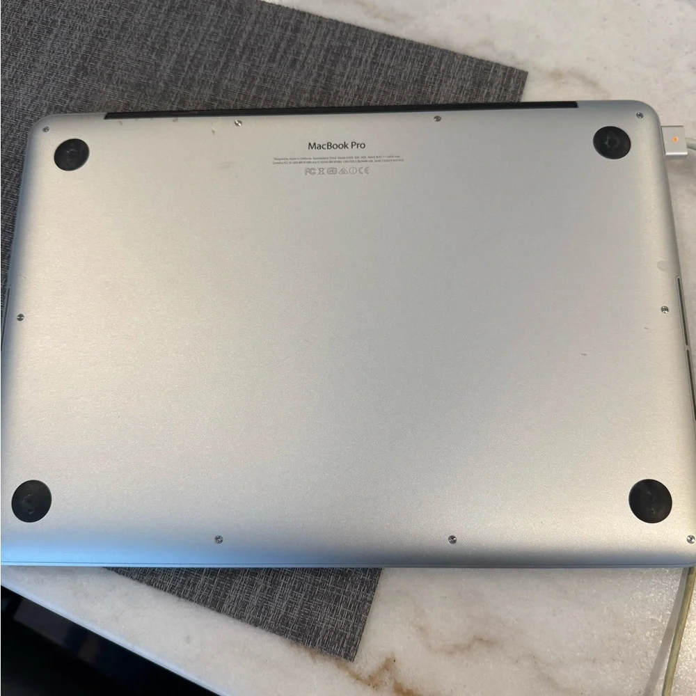 Apple Silver MacBook Pro with Black Keyboard